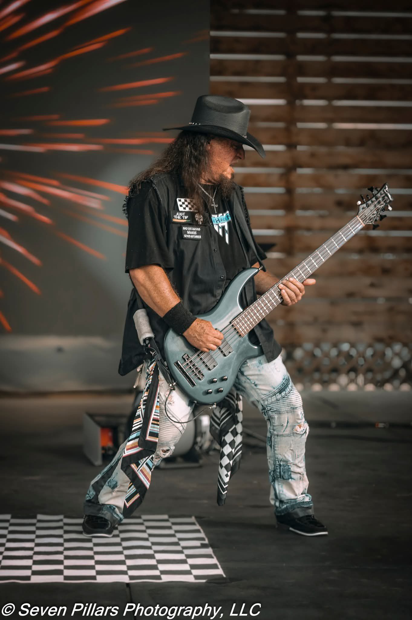 Bassist performing live on stage